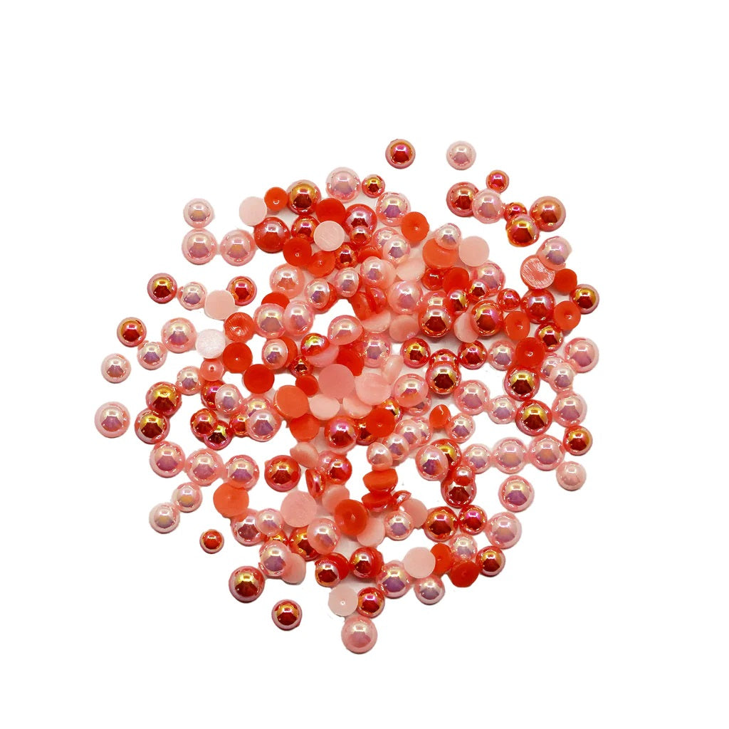 Pink bora Bora Half Pearlz embellishments