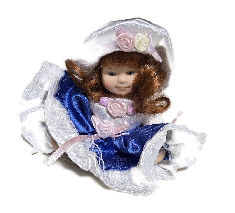 Miniature Jointed Porcelain Doll